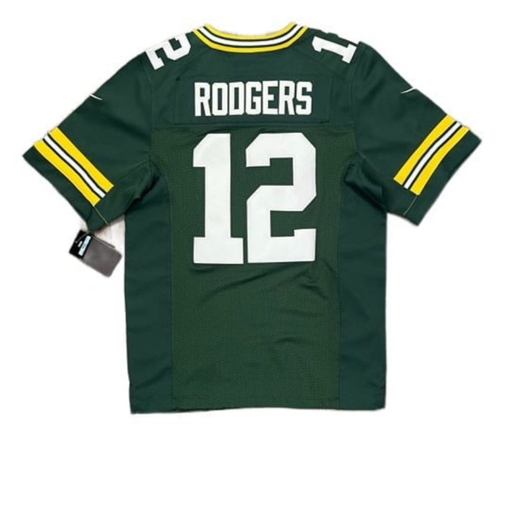 Rodger’s jersey. Embroidered numbers and name on back. Mesh sidings. On field.